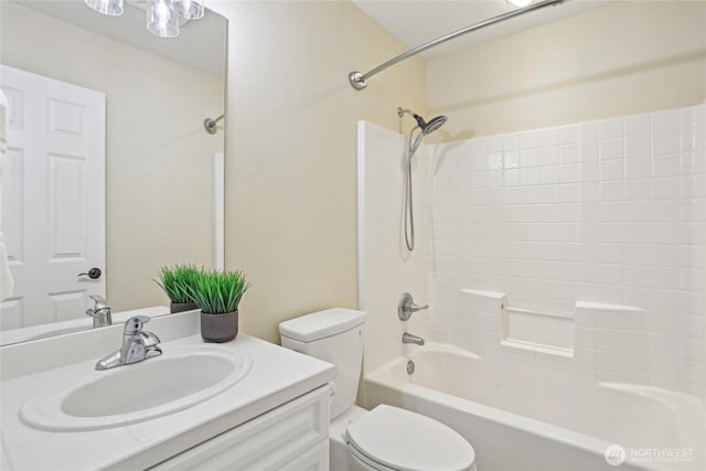 2070 277th Ave SE, Sammamish, WA 98075 - bathroom featuring toilet, vanity, and bathing tub / shower combination