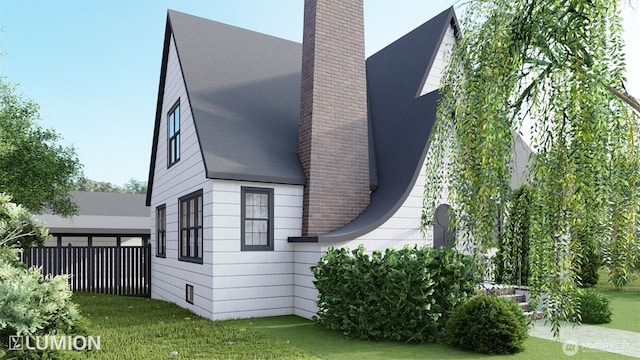 417 N Columbia St, Chelan, WA 98816 - view of side of home with a chimney, a lawn, and a shingled roof