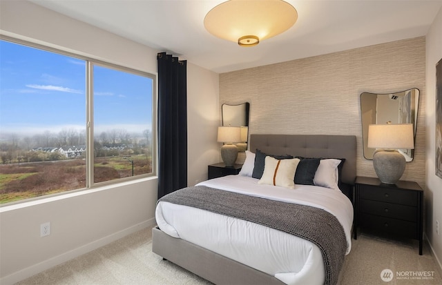 carpeted bedroom with baseboards