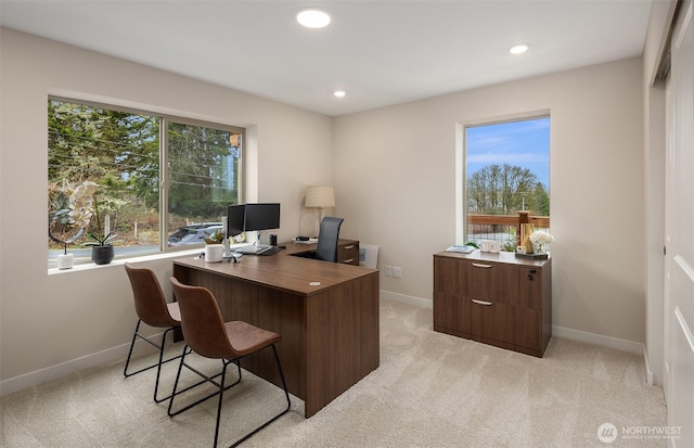 office featuring light carpet, recessed lighting, and baseboards