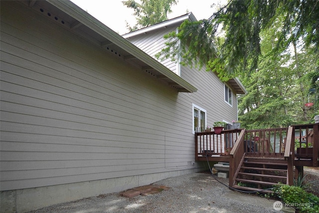 21901 N Clearlake Blvd SE, Yelm, WA 98597 - view of property exterior with a wooden deck