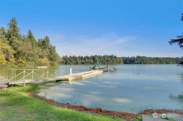 21901 N Clearlake Blvd SE, Yelm, WA 98597 - dock area with a boat ramp, a wooded view, and a water view