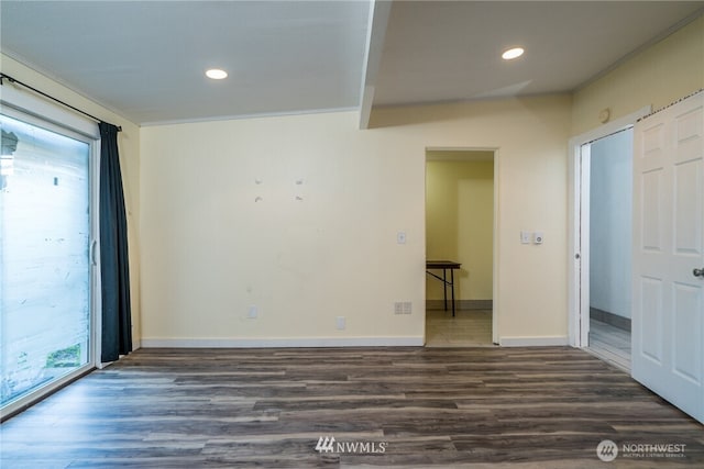 11709 26th Ave NE, Seattle, WA 98125 - spare room with dark wood-type flooring, recessed lighting, and baseboards