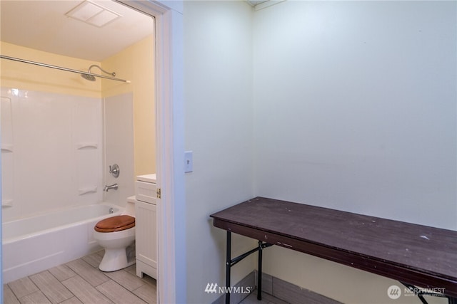 11709 26th Ave NE, Seattle, WA 98125 - bathroom featuring vanity, visible vents, wood finish floors, bathtub / shower combination, and toilet