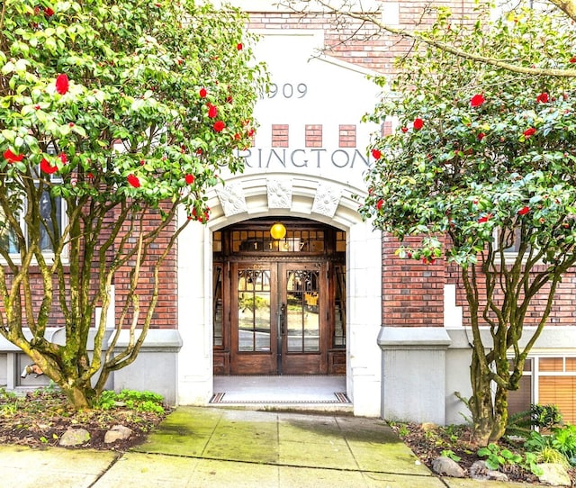 1107 E Denny Way Unit A-4, Seattle, WA 98122 - entrance to property with brick siding and french doors