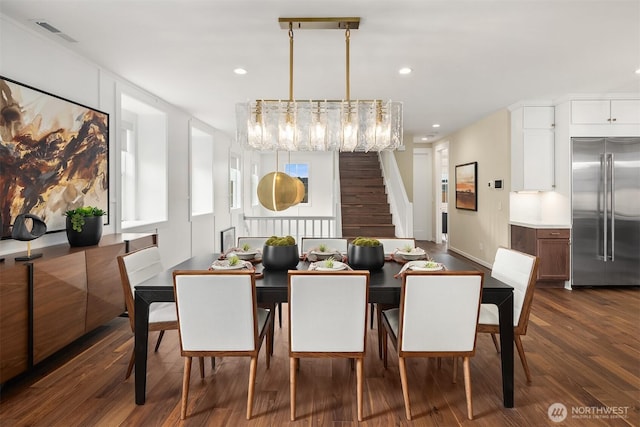 dining room with dark wood finished floors, stairway, recessed lighting, and visible vents