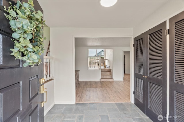 1309 W 5th St, Aberdeen, WA 98520 - entryway with baseboards and wood finished floors