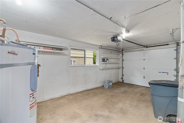 1309 W 5th St, Aberdeen, WA 98520 - garage with water heater and a garage door opener