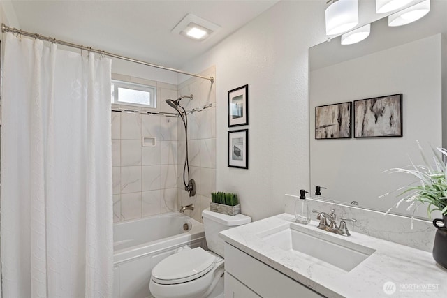 full bathroom with toilet, shower / bathtub combination with curtain, and vanity
