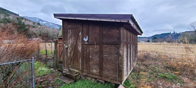 136 Mule Dr, Glenoma, WA 98336 - view of shed featuring a mountain view and fence