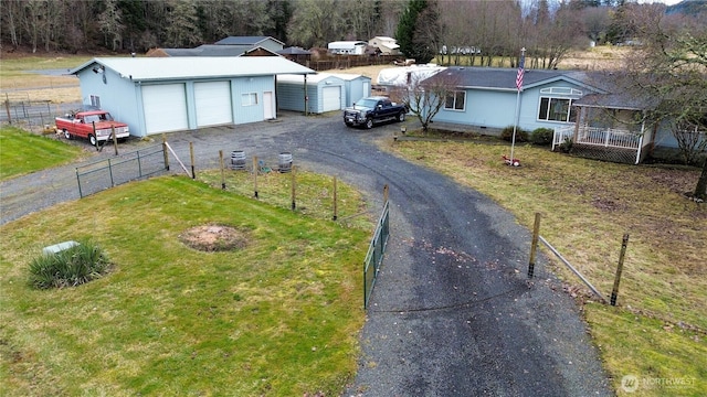 136 Mule Dr, Glenoma, WA 98336 - exterior space featuring driveway, fence, an outdoor structure, a front yard, and crawl space