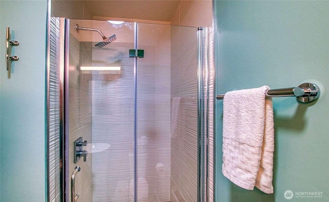 bathroom with a stall shower
