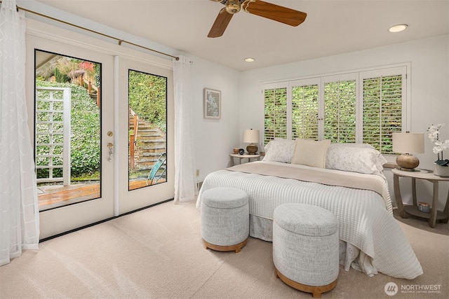 bedroom with ceiling fan, recessed lighting, access to exterior, carpet flooring, and french doors