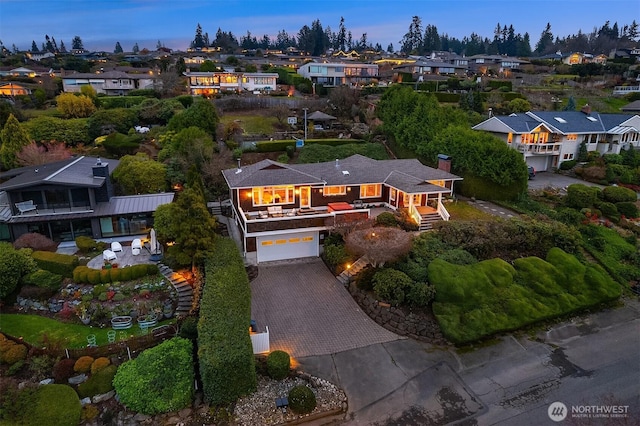 aerial view at dusk with a residential view