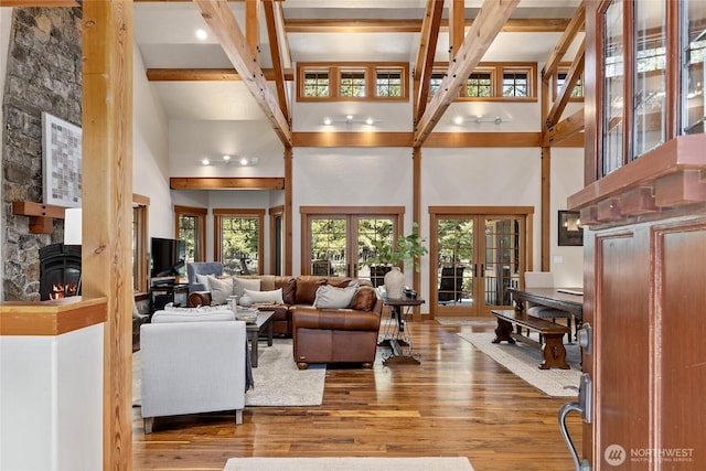 121 Hard Scrabble Ln, Cle Elum, WA 98922 - living area with a towering ceiling, beamed ceiling, wood finished floors, and french doors