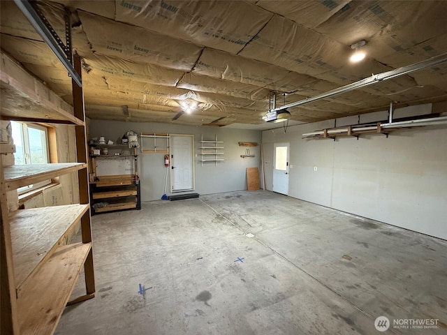 garage featuring a garage door opener