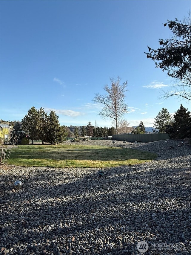 view of yard featuring fence