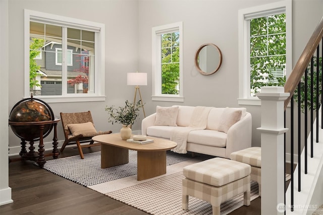 1497 Elk Run Pl SE, North Bend, WA 98045 - living area featuring wood finished floors, stairway, and baseboards