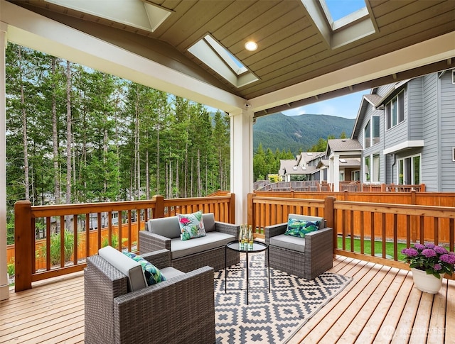 1497 Elk Run Pl SE, North Bend, WA 98045 - wooden terrace with outdoor lounge area and a mountain view