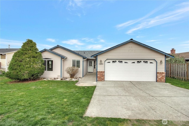 1529 Thompson Dr, Camano Island, WA 98282 - single story home featuring a front yard, fence, driveway, a garage, and brick siding