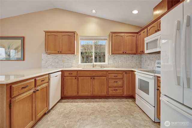 1529 Thompson Dr, Camano Island, WA 98282 - kitchen featuring white appliances, light countertops, lofted ceiling, and a sink