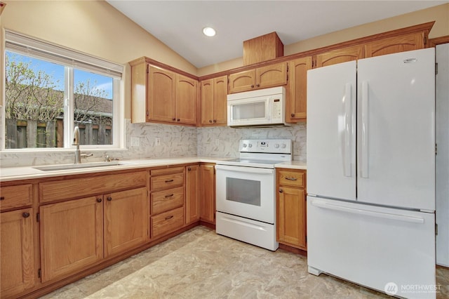 1529 Thompson Dr, Camano Island, WA 98282 - kitchen featuring a sink, white appliances, light countertops, decorative backsplash, and lofted ceiling