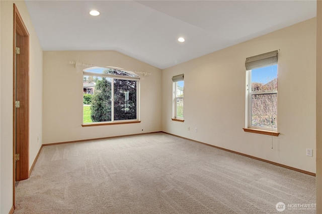 1529 Thompson Dr, Camano Island, WA 98282 - carpeted spare room with lofted ceiling, baseboards, and a wealth of natural light