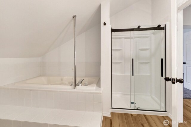 13574 S Green St, Anacortes, WA 98221 - bathroom with a bath, a stall shower, wood finished floors, and lofted ceiling