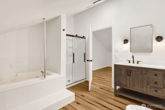 13574 S Green St, Anacortes, WA 98221 - bathroom featuring a bath, a stall shower, wood finished floors, and vanity