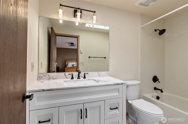 ensuite bathroom featuring ensuite bathroom, vanity, shower / bath combination, toilet, and visible vents