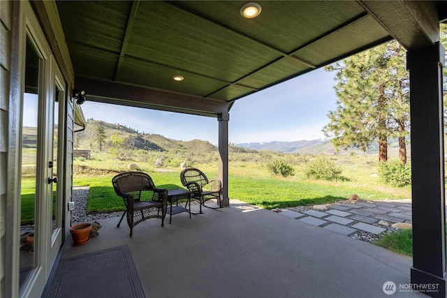 view of patio featuring a mountain view