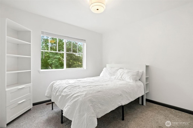 bedroom featuring baseboards, visible vents, and carpet floors
