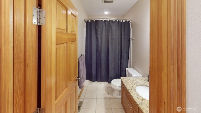 full bathroom featuring tile patterned floors, vanity, curtained shower, toilet, and visible vents