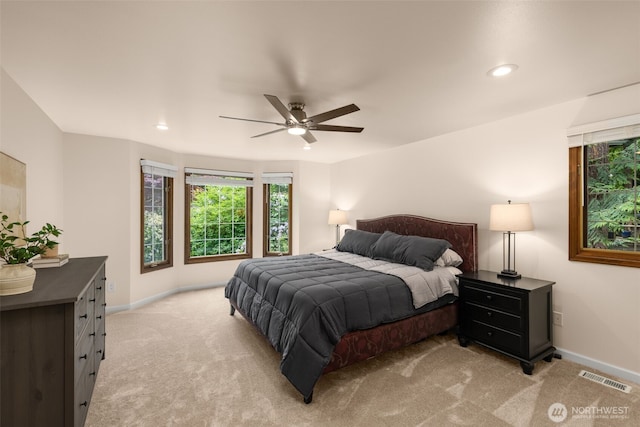 4381 239th Pl SE, Sammamish, WA 98029 - bedroom with light colored carpet, baseboards, recessed lighting, and a ceiling fan