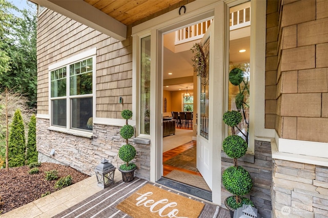 view of exterior entry with stone siding