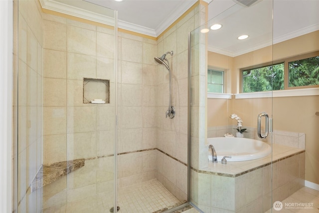 bathroom with a stall shower, a bath, visible vents, and ornamental molding