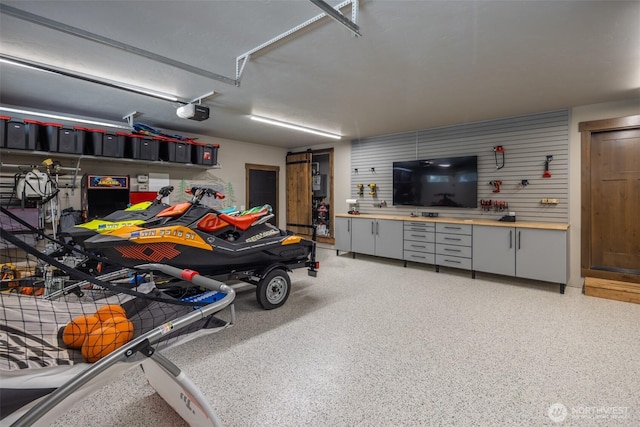 garage featuring a garage door opener