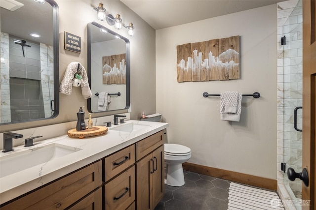 full bathroom with a sink, tile patterned floors, and a shower stall