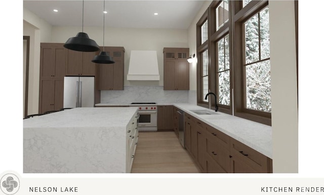 581 Wanawish Loop, Cle Elum, WA 98922 - kitchen with appliances with stainless steel finishes, custom range hood, a sink, tasteful backsplash, and recessed lighting