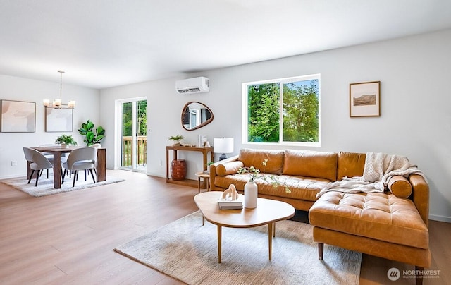1512 Alder Ln, Gold Bar, WA 98251 - living area with a wall mounted air conditioner, a chandelier, and wood finished floors