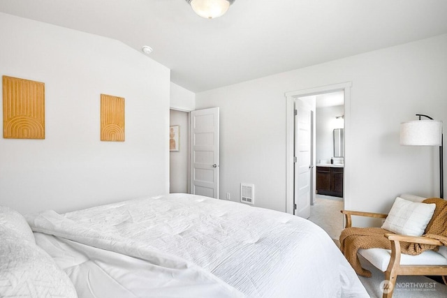 1512 Alder Ln, Gold Bar, WA 98251 - bedroom featuring light colored carpet, vaulted ceiling, and connected bathroom