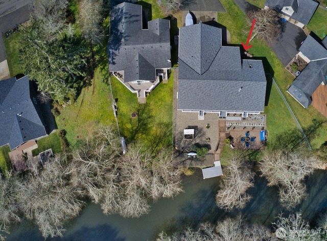 birds eye view of property with a residential view