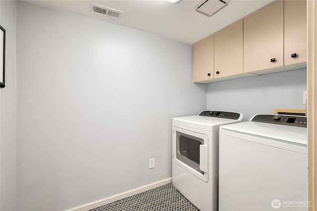 laundry room with visible vents, washer and dryer, cabinet space, tile patterned flooring, and baseboards