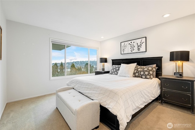 bedroom featuring recessed lighting, baseboards, and light carpet