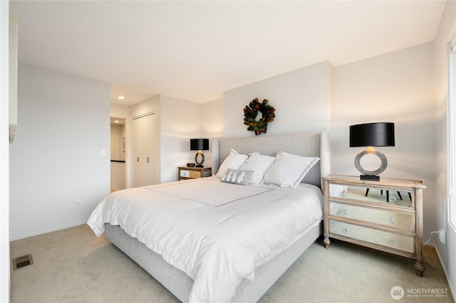 carpeted bedroom featuring recessed lighting, baseboards, visible vents, and a closet