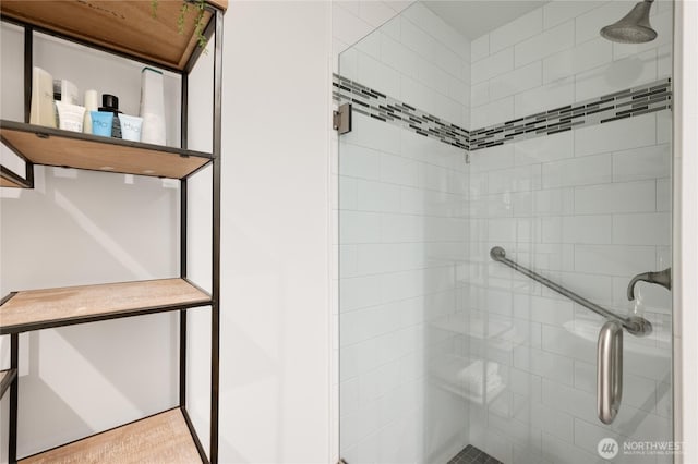 full bathroom featuring a shower stall