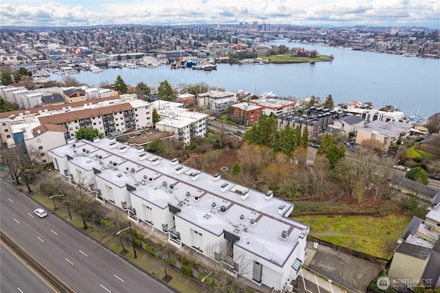 aerial view with a water view and a city view