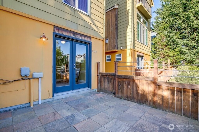 2120 W Ruffner St, Seattle, WA 98199 - entrance to property with fence, french doors, and a patio