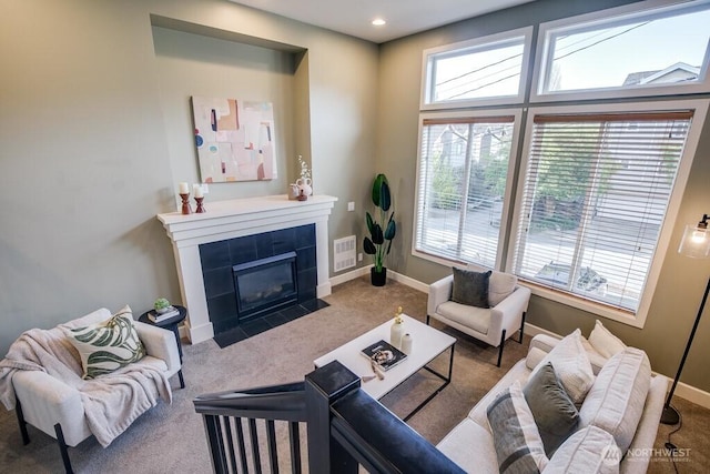 2120 W Ruffner St, Seattle, WA 98199 - carpeted living room with recessed lighting, a tile fireplace, visible vents, and baseboards