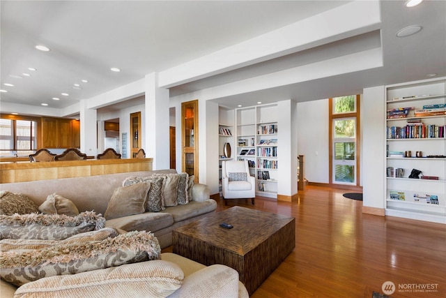 17884 S Angeline Ave NE, Suquamish, WA 98392 - living room featuring built in shelves, wood finished floors, and recessed lighting
